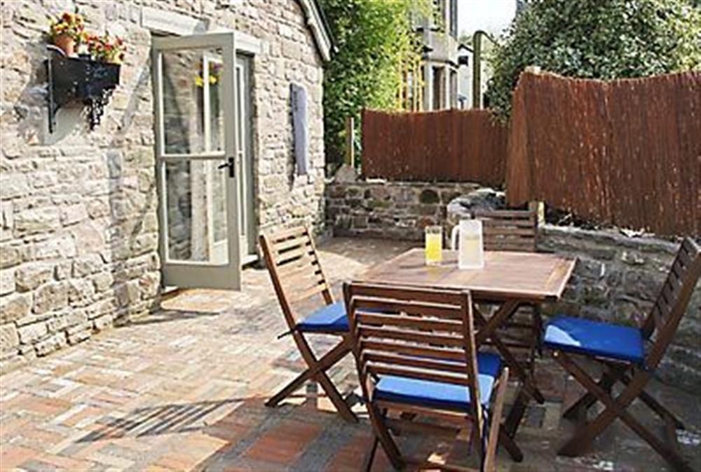 Courtyard style garden at The Coach House in St Briavels, Gloucestershire., Great Britain