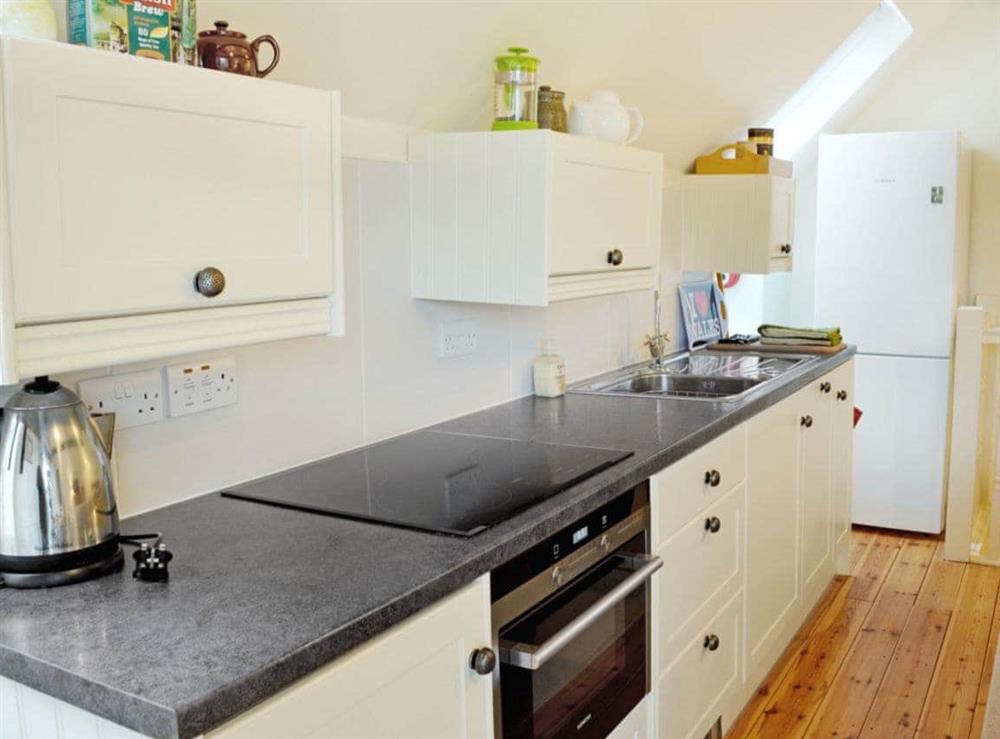 Open plan living/dining room/kitchen (photo 3) at The Coach House in St. Garmons, Llanarmon Dyffryn Ceiriog, Denbighshire