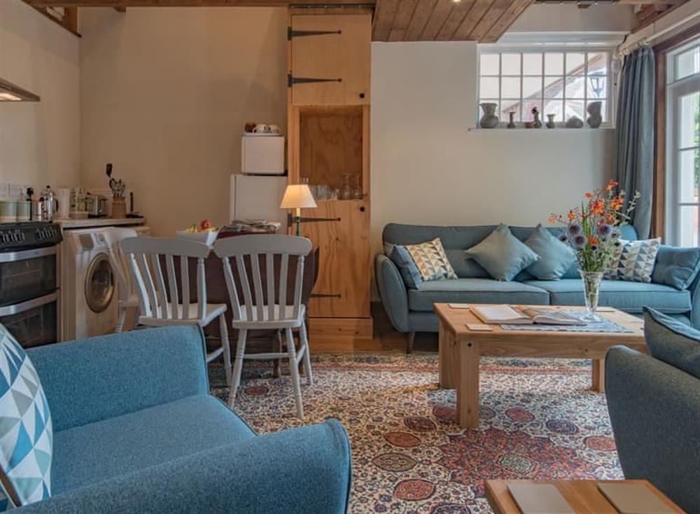 Welcoming open-plan living space at The Coach House Stables in Hernhill, England