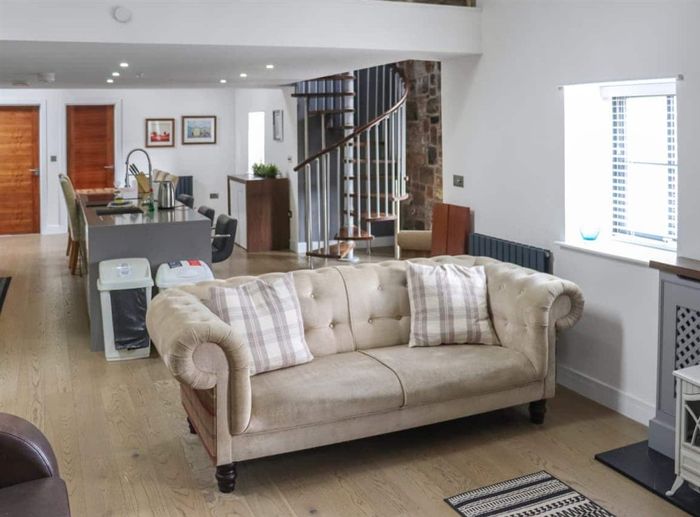Open plan living space at The Coach-House in Tenby, Dyfed
