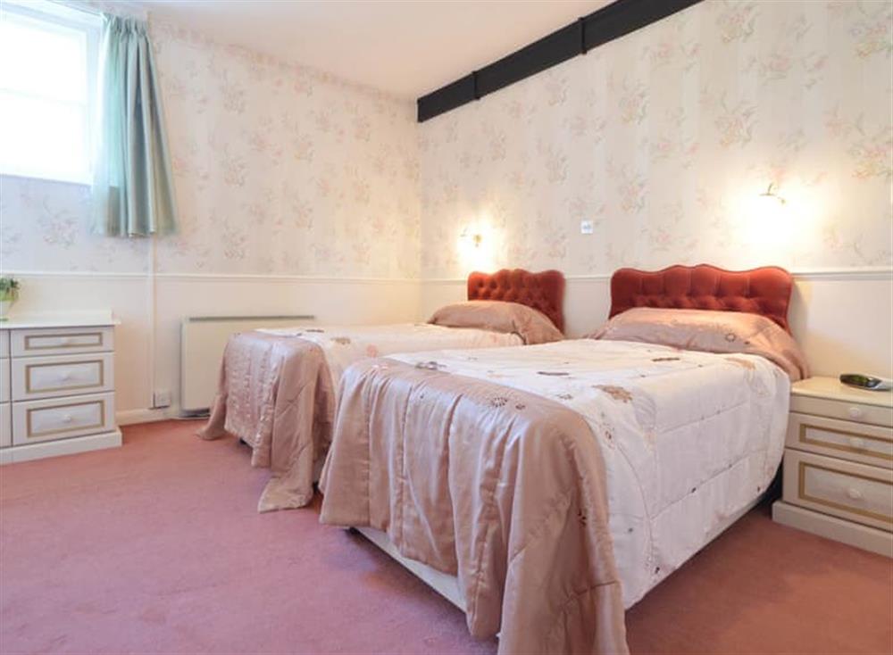 Triple bedroom at The Coach House in Torquay, South Devon