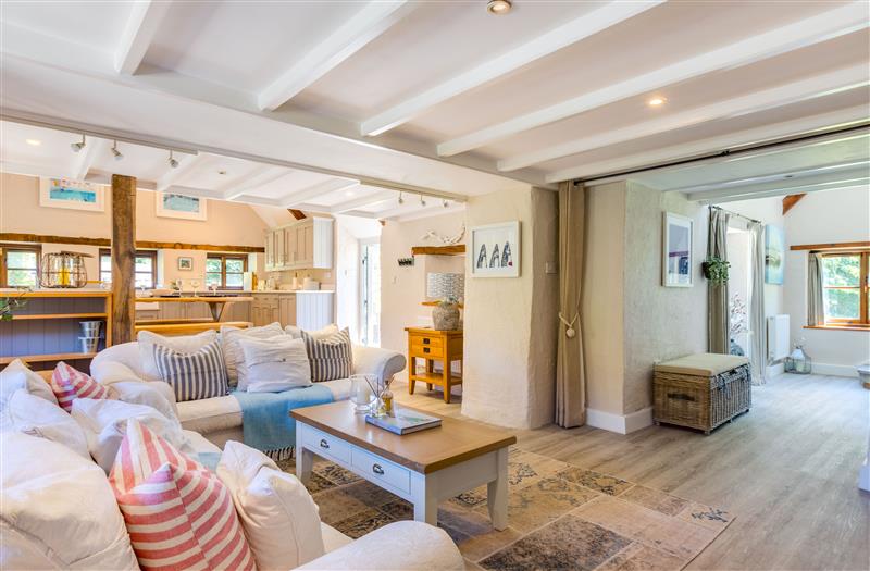 Enjoy the living room at The Coach House, Trevibban Barton near Padstow