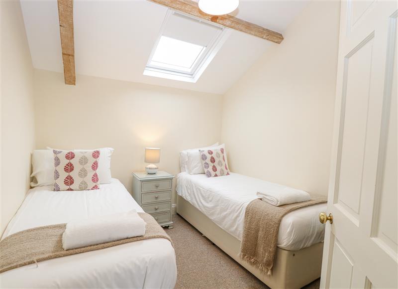 One of the bedrooms at The Coach House, Tunstead near Stalham