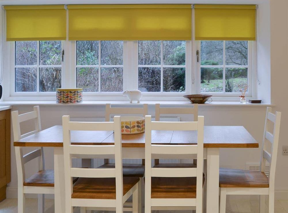 Farmhouse kitchen-style dining table at The Coach House in White Moss, near Grasmere, Cumbria, England