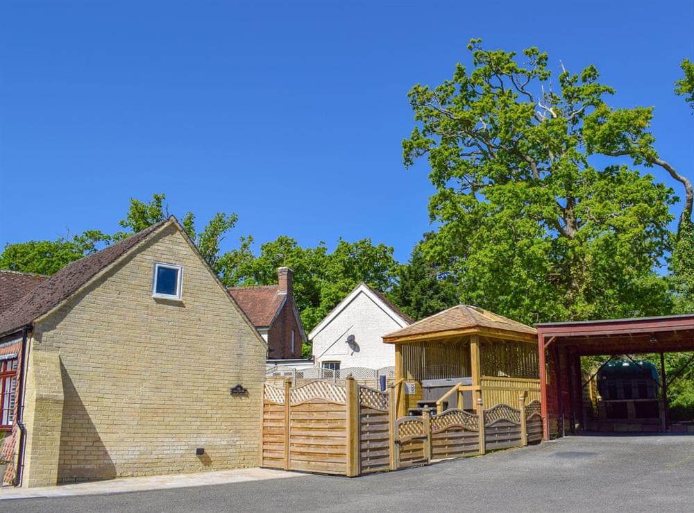 Exterior and guests car port at The Coach House in Wootton, near Ryde, Isle of Wight