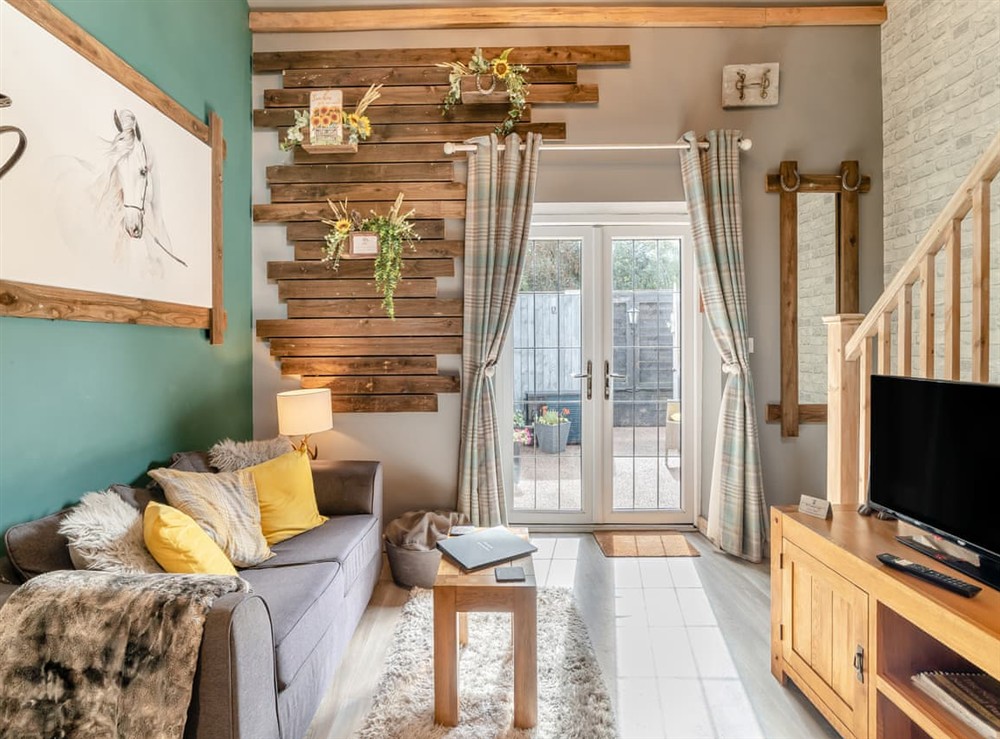 Living area (photo 2) at The Coachmans Cottage in Ringwood, New Forest, Hampshire