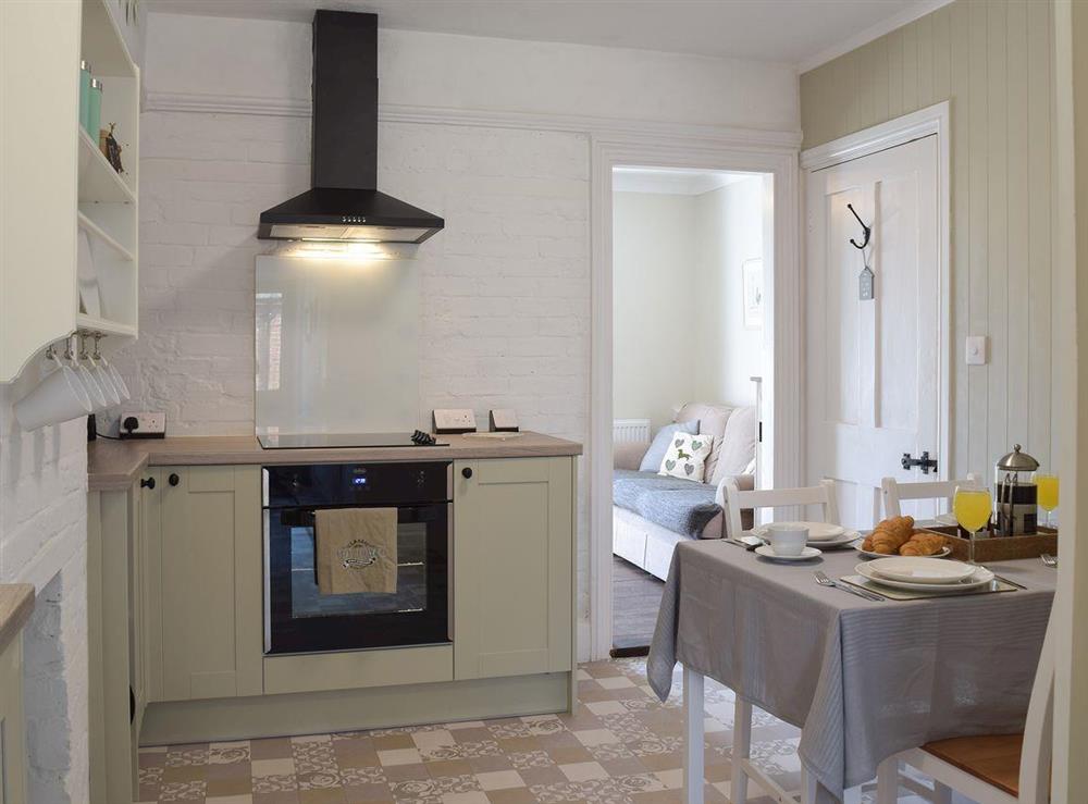 Kitchen & dining area at The Coastal Cottage in Kessingland, Suffolk, England