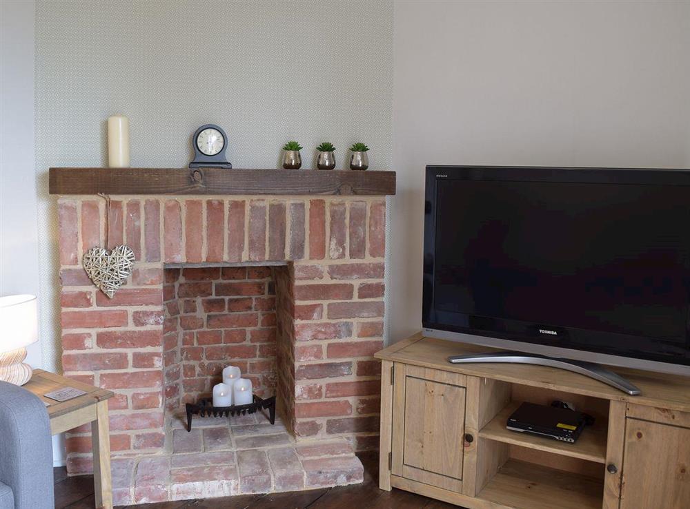 Living room at The Coastal Cottage in Kessingland, Suffolk, England