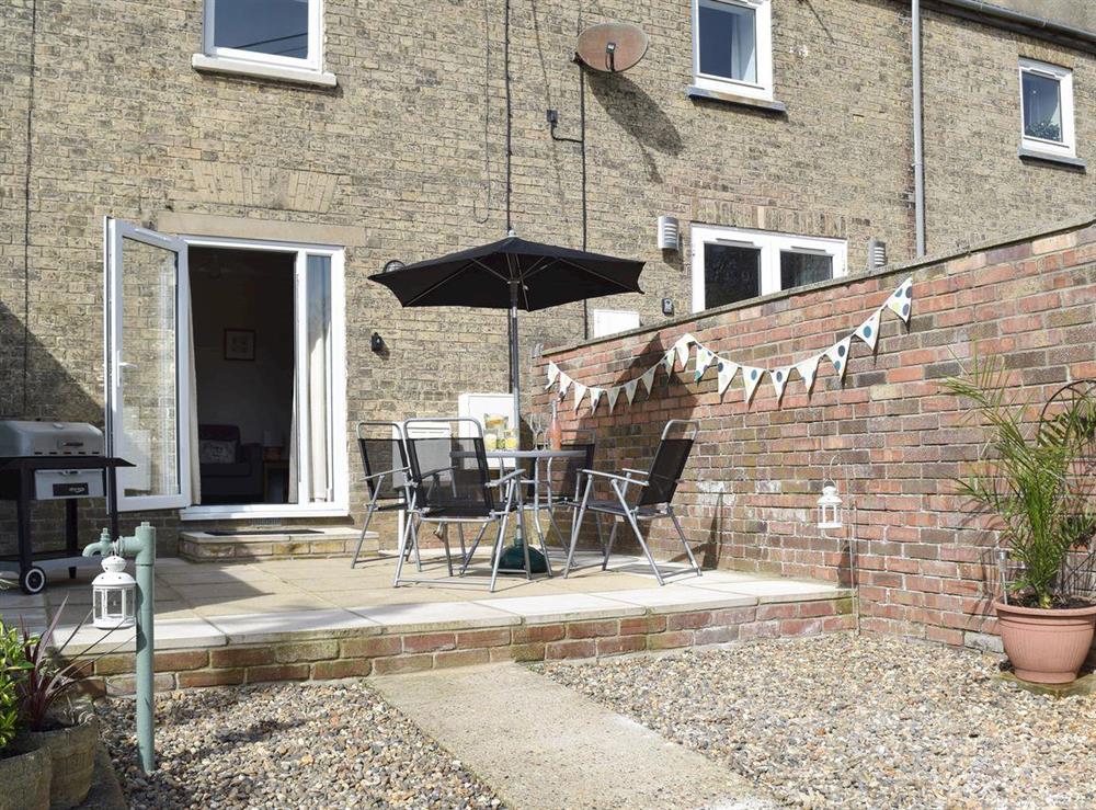 Sitting out area at The Coastal Cottage in Kessingland, Suffolk, England