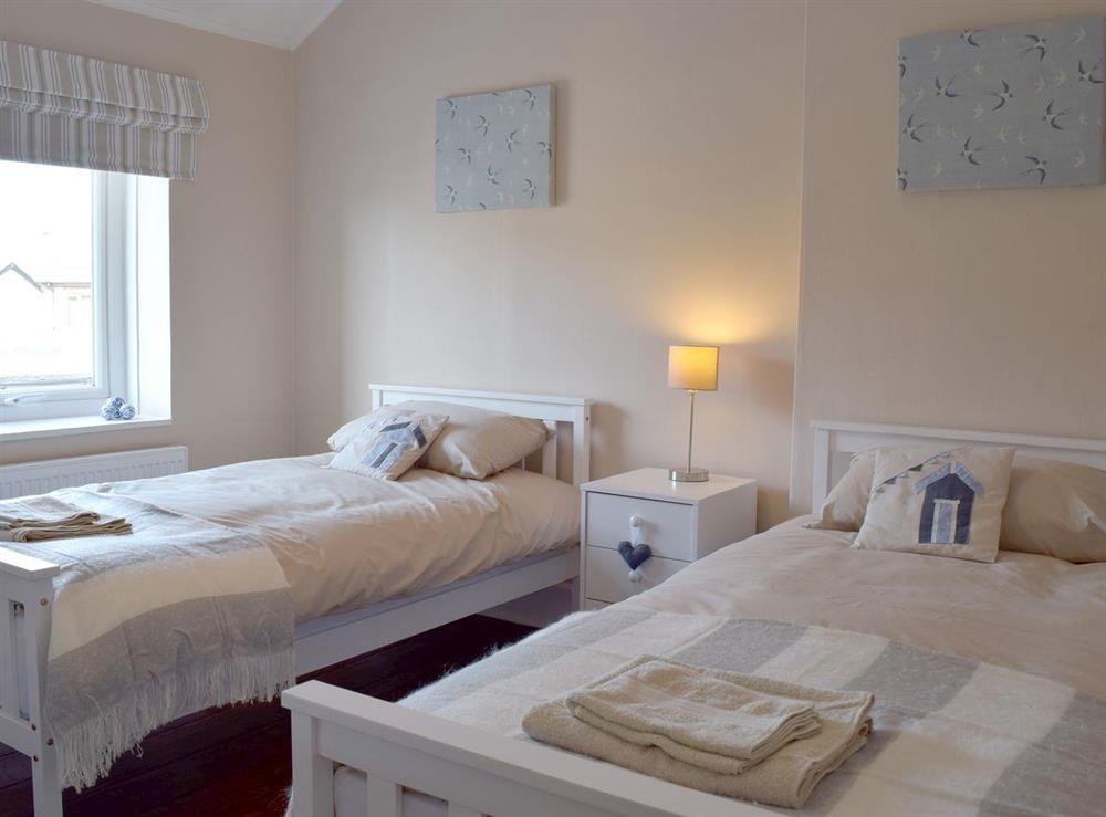 Twin bedroom at The Coastal Cottage in Kessingland, Suffolk, England