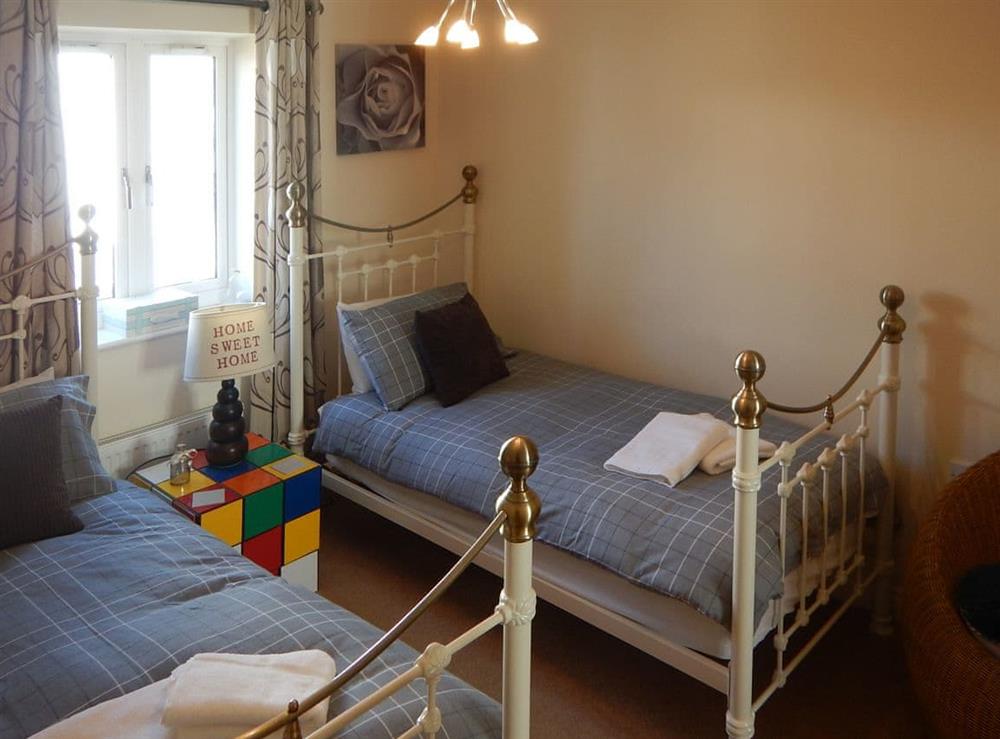 Twin bedroom at The Coastal Hideaway in Sidmouth, Devon
