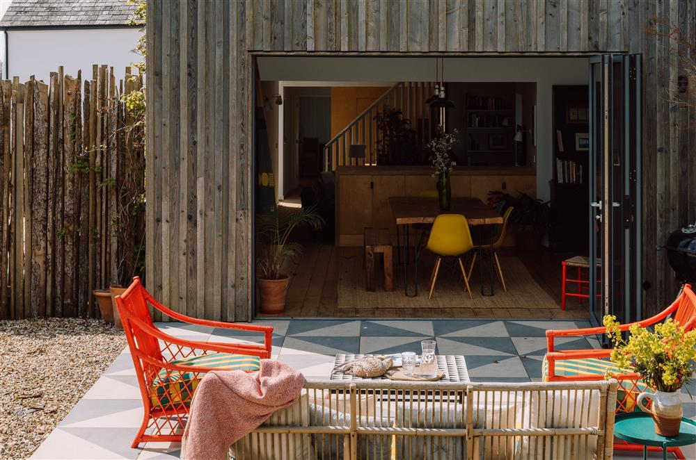 The bi-folding doors lead to the terrace area