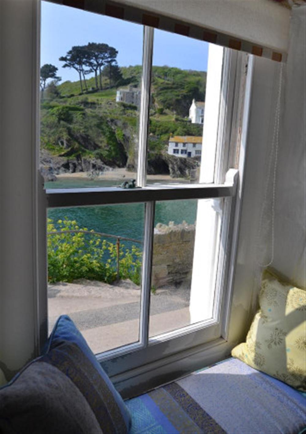 The beach, seen through the dining room window at The Cobbles in Polperro