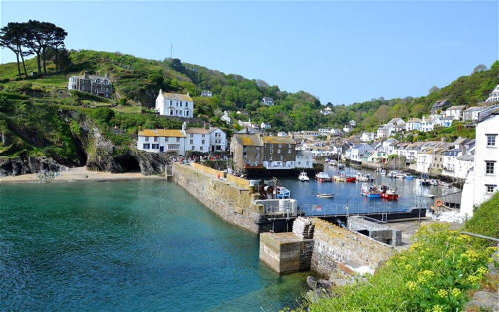 The view of the Polperro fishing harbour from the lane outside The Cobbles at The Cobbles in Polperro