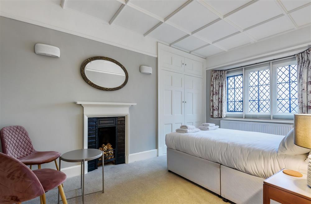 Bedroom two with a 5’ king-size bed and en-suite bathroom at The Cochrane Wing, Dorchester