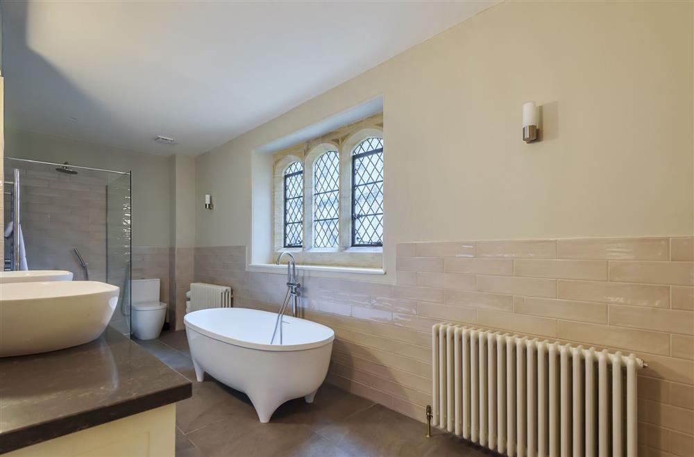 En-suite to bedroom one with roll-top bath at The Cochrane Wing, Dorchester