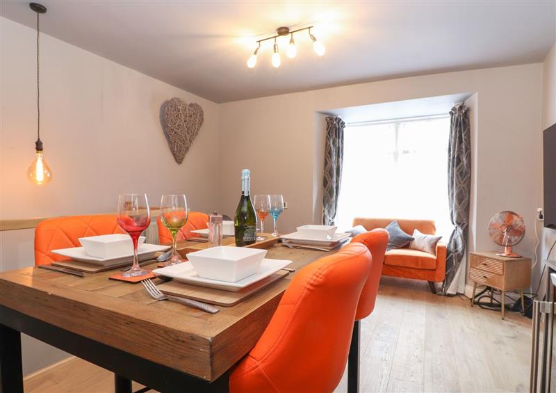 Relax in the living area at The Copper Loft, Windermere