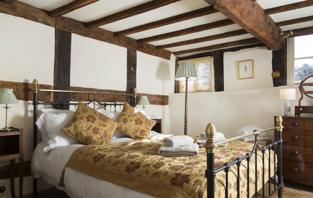 Double bedroom with king size 5’ bed and period features at The Coppice, Ashton under Hill