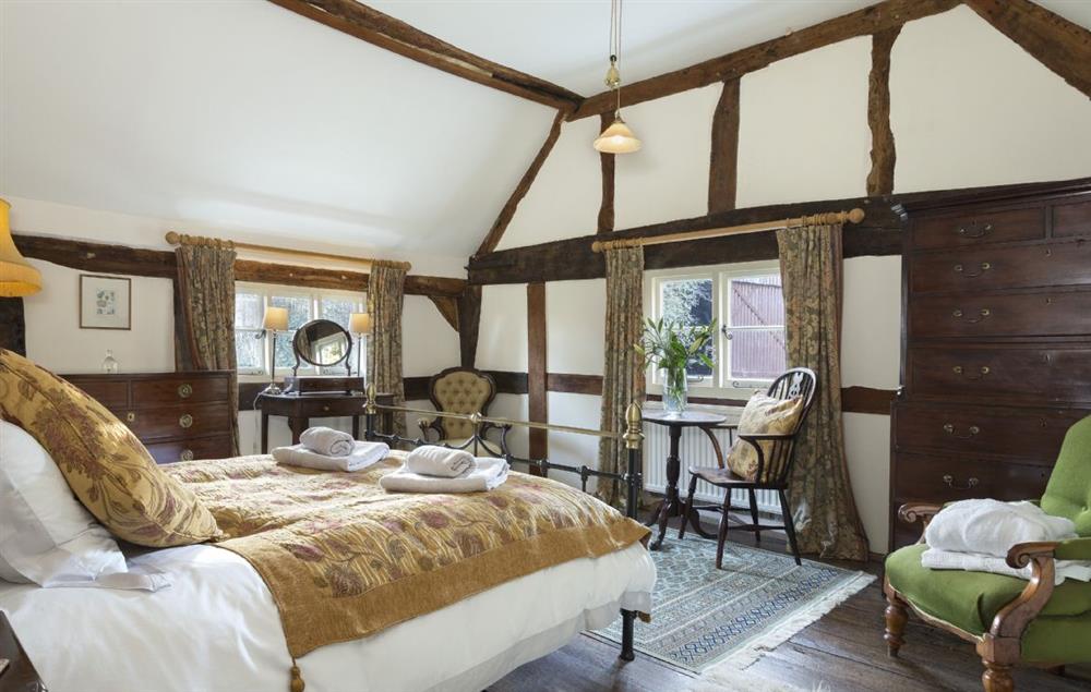 Master bedroom with king size 5’ bed and period features at The Coppice, Ashton under Hill