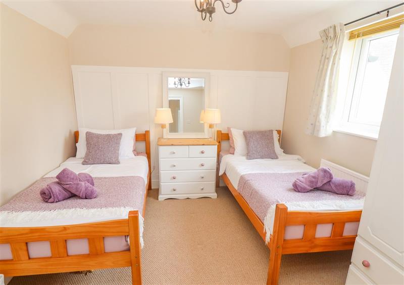 One of the bedrooms at The Cornerstone, Bourton-On-The-Water