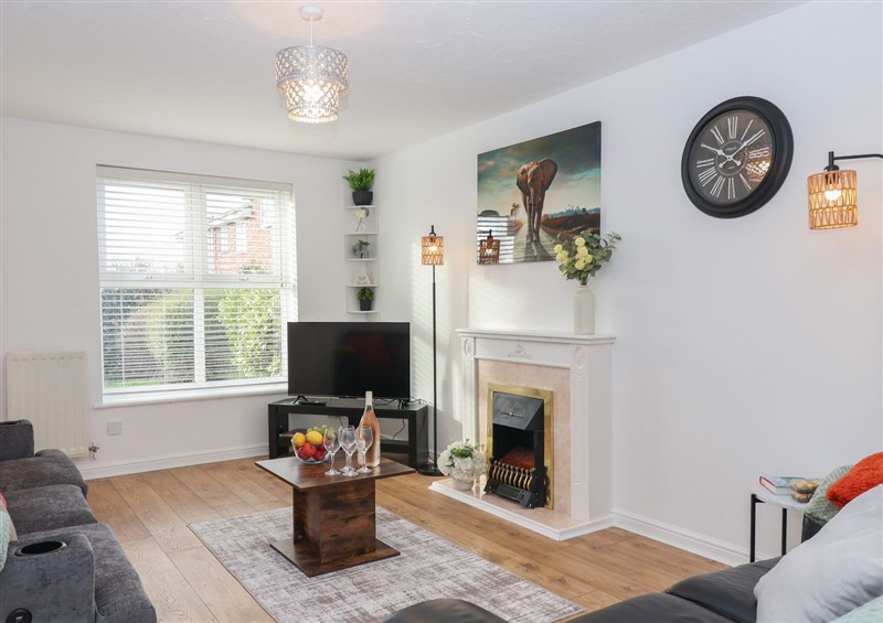 Relax in the living area at The Cosy View, Paignton