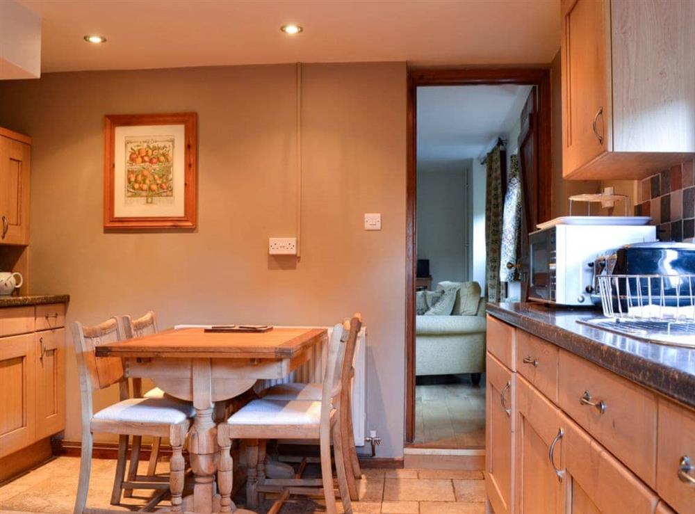 Great kitchen diner with cottage style dining area at The Cot in Bussage, near Cirencester, Gloucestershire