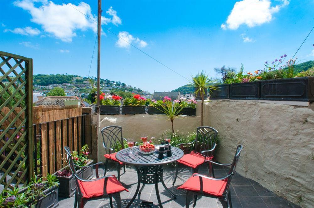 13 Clarence Hill has a lovely courtyard terrace with table and chairs at The Cottage (13 Clarence hill) in 13 Clarence Hill, Dartmouth