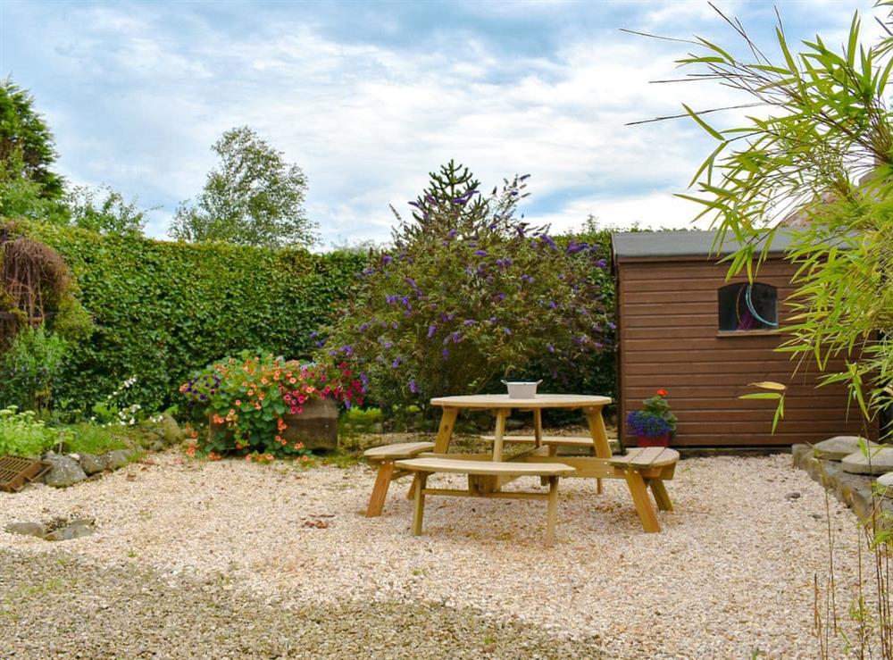 Charming patio area at The Cottage at Cauldcoats in Near Linlithgow, West Lothian