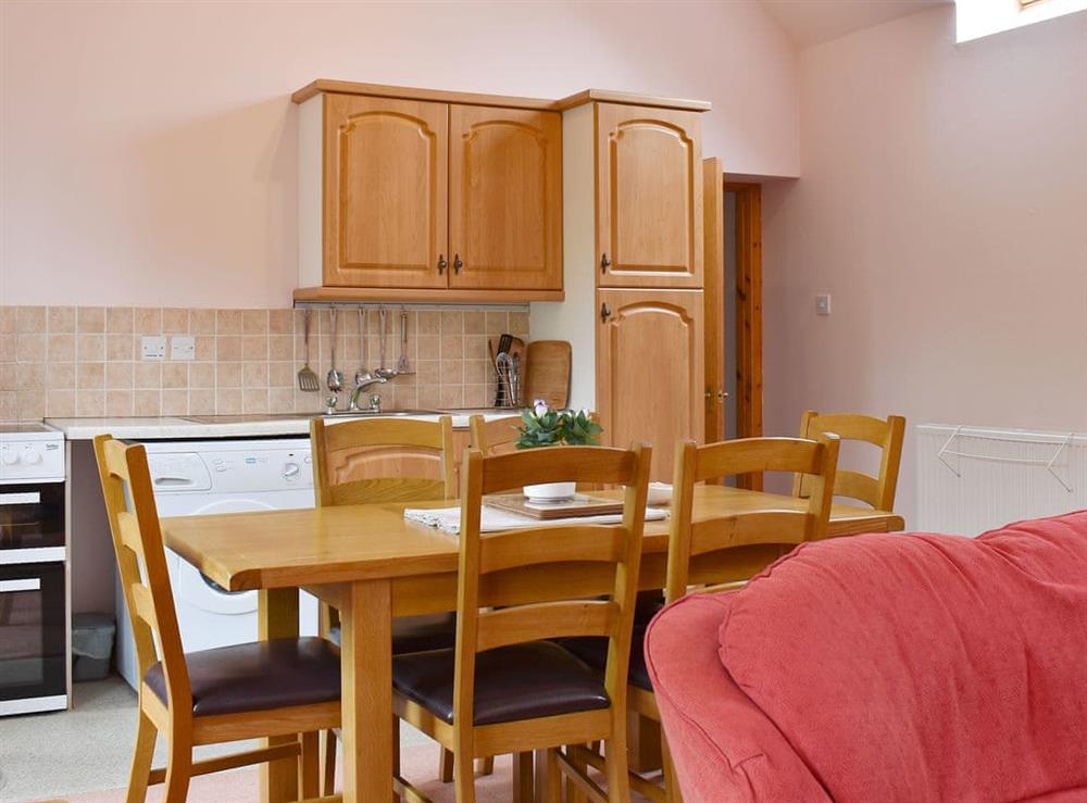 Well equipped kitchen/ dining area at The Cottage at Cauldcoats in Near Linlithgow, West Lothian