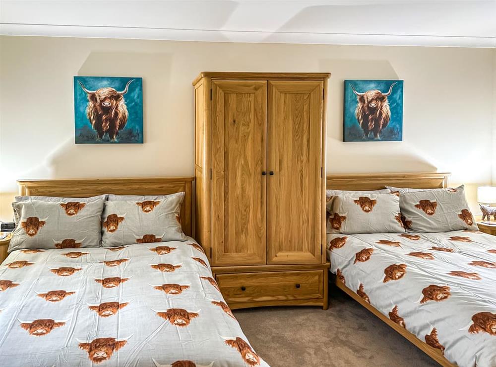 Twin bedroom at The Cottage at Lochinvar in Plains, near Airdrie, Lanarkshire