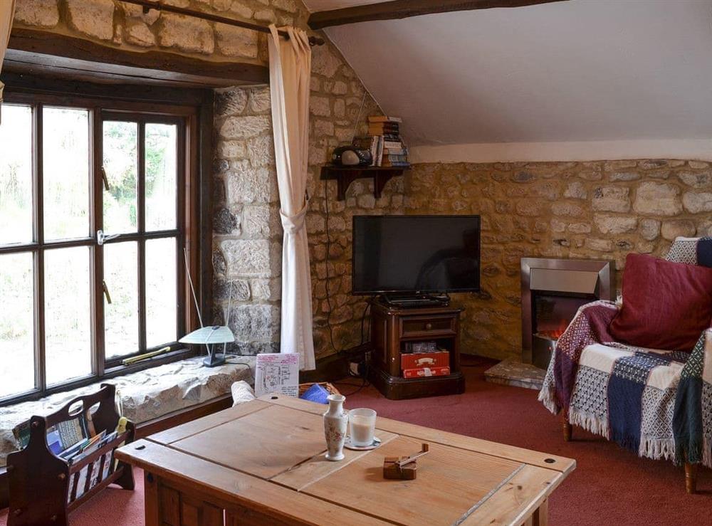 Cosy living room at The Cottage in Axminster, Devon