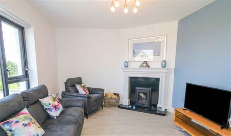Relax in the living area at The Cottage, Carrickmacgarvey near Derrybeg