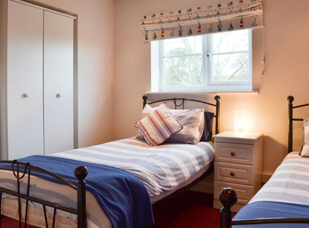 Twin bedroom at The Cottage in Dulas, Anglesey, Gwynedd