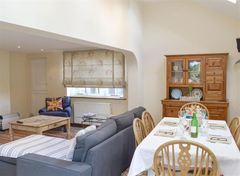 Convenient dining area at The Cottage Island Heron in Wolverton Common, near Tadley, Hampshire