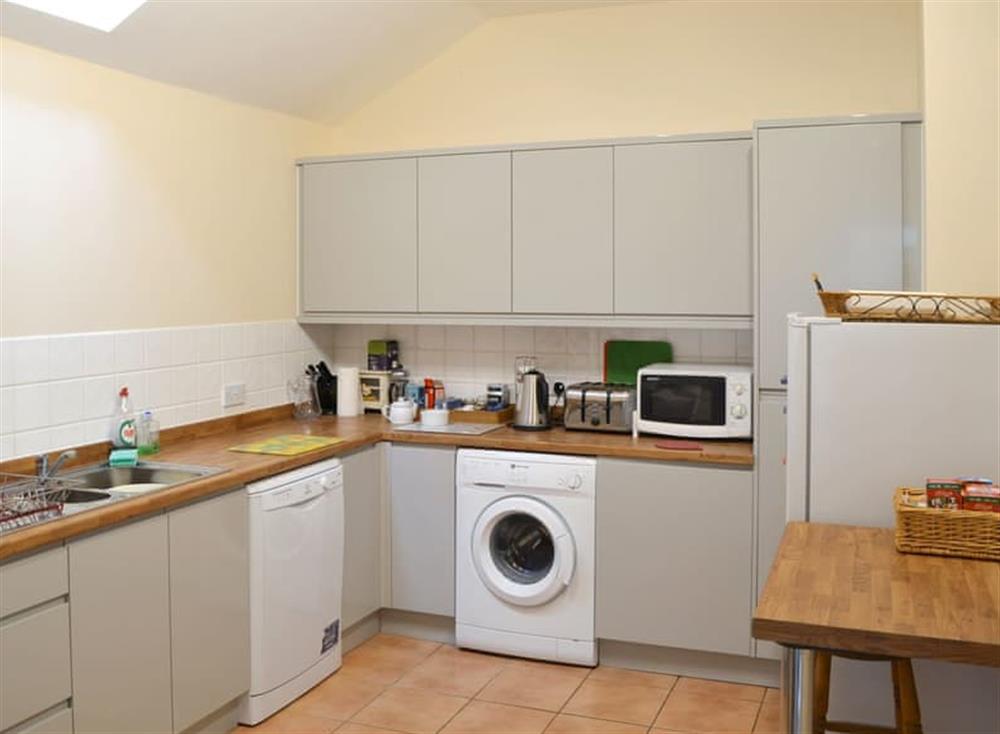 Fully appointed kitchen at The Cottage Island Heron in Wolverton Common, near Tadley, Hampshire