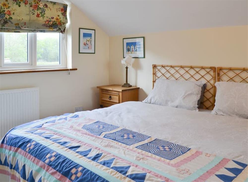 Peaceful double bedroom at The Cottage Island Heron in Wolverton Common, near Tadley, Hampshire