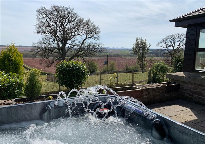 Spend some time in the hot tub at The Cottage, Methven