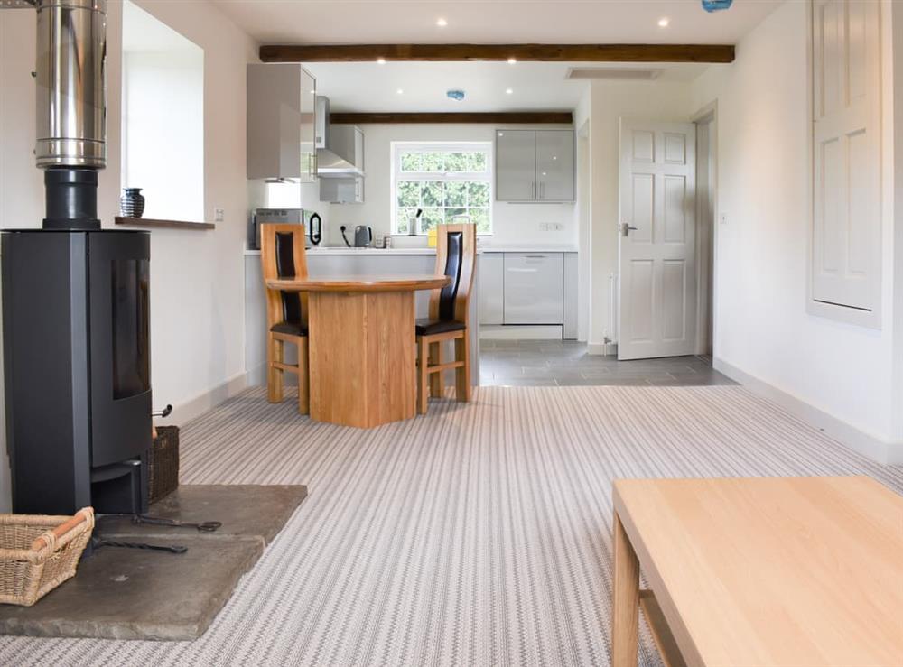 Open plan living space at The Cottage Middle West Water in Westwater, near Axminster, Devon