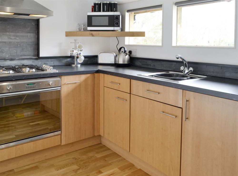 Well-equipped fitted kitchen at The Cottage in Milton, near Drumnadrochit, Highlands, Inverness-Shire