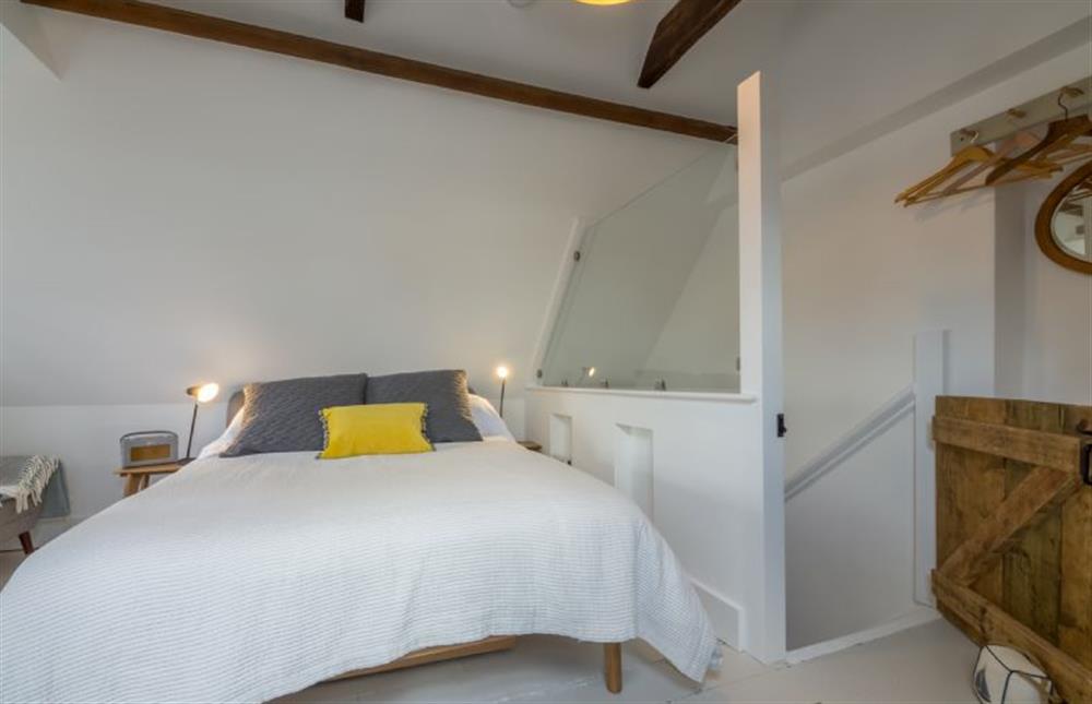 Second floor: Master bedroom with king-size bed at The Cottage (Ringstead), Ringstead near Hunstanton