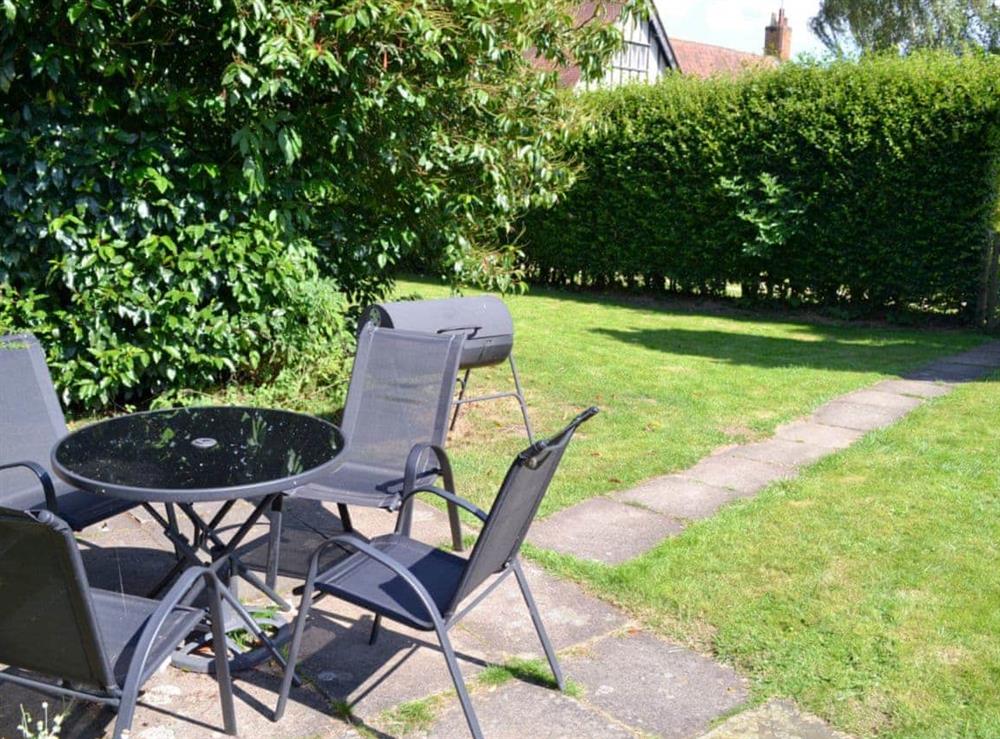 Garden with outdoor furniture and BBQ at The Cottage in Scarning, near Dereham, Norfolk