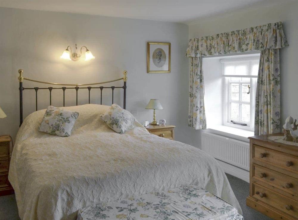Comfortable master bedroom at The Cottage in Sinnington, near Pickering, North Yorkshire