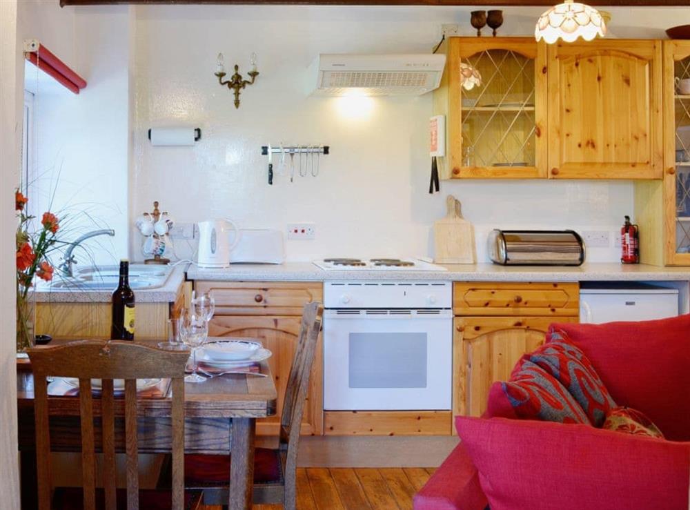 Modest kitchen/dining area at The Cottage in St. Cyrus, Montrose, Angus