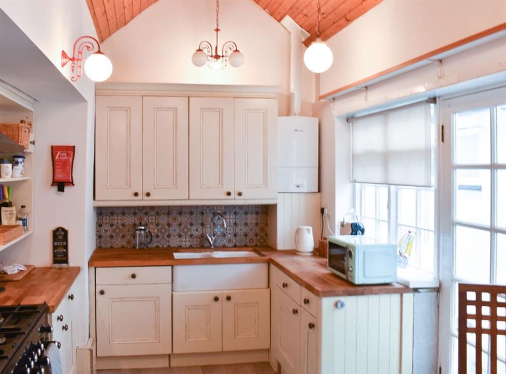 Well fitted and equipped kitchen at The Cottage by the Sea, 