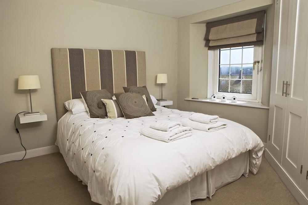 Master bedroom with King-size bed at The Court House in Buckley Street, Salcombe