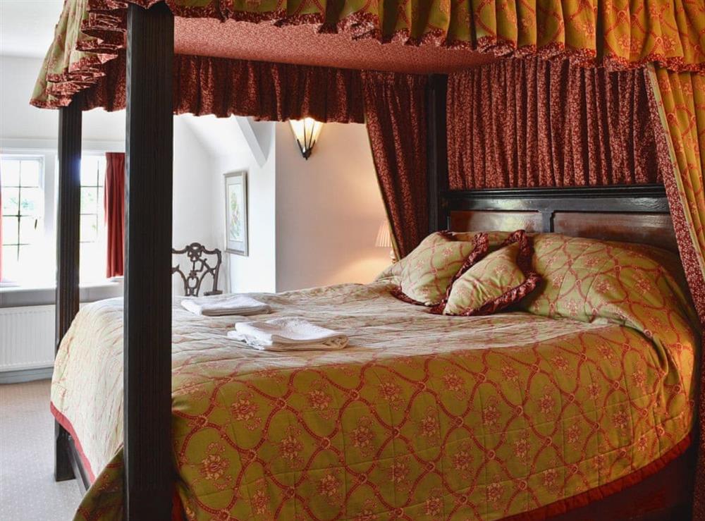 Four Poster bedroom at The Court in Wern-y-Wylan, Anglesey, Gwynedd