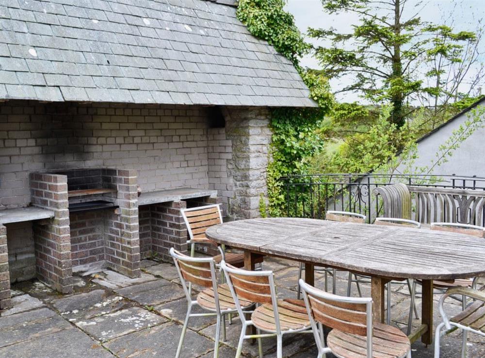 Outdoor eating area at The Court in Wern-y-Wylan, Anglesey, Gwynedd