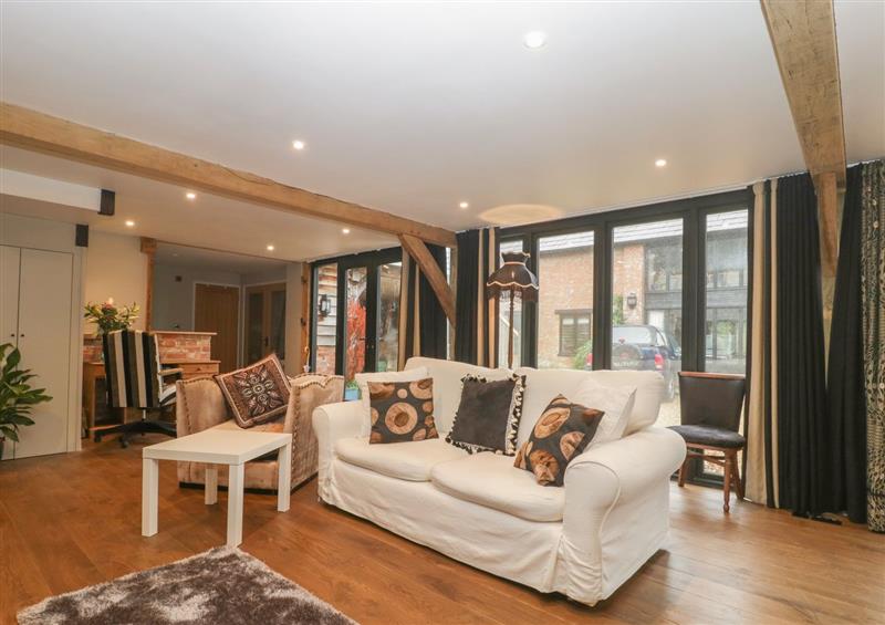 Enjoy the living room at The Courtyard - Hilltop Barn, Winterborne Zelston near Wareham
