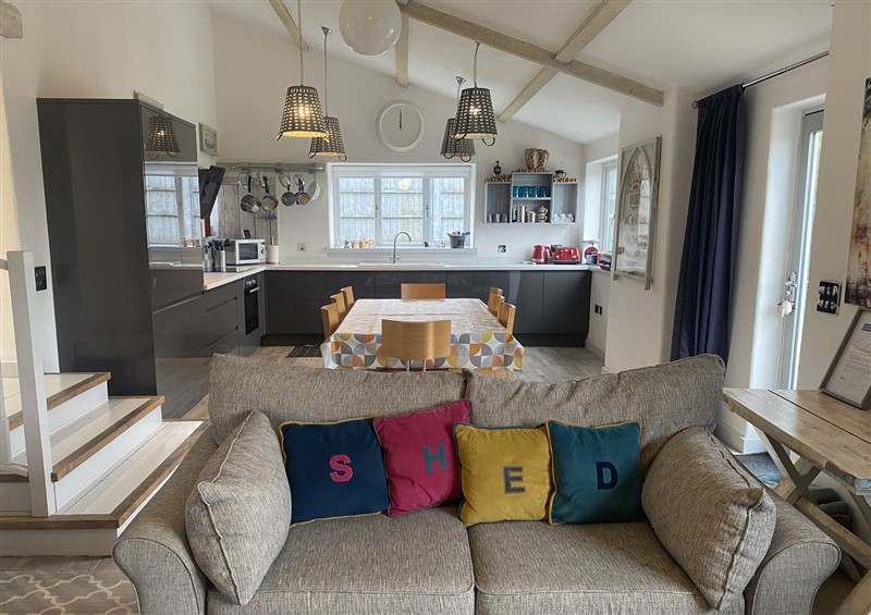 Relax in the living area at The Cow Shed, Bishopswood
