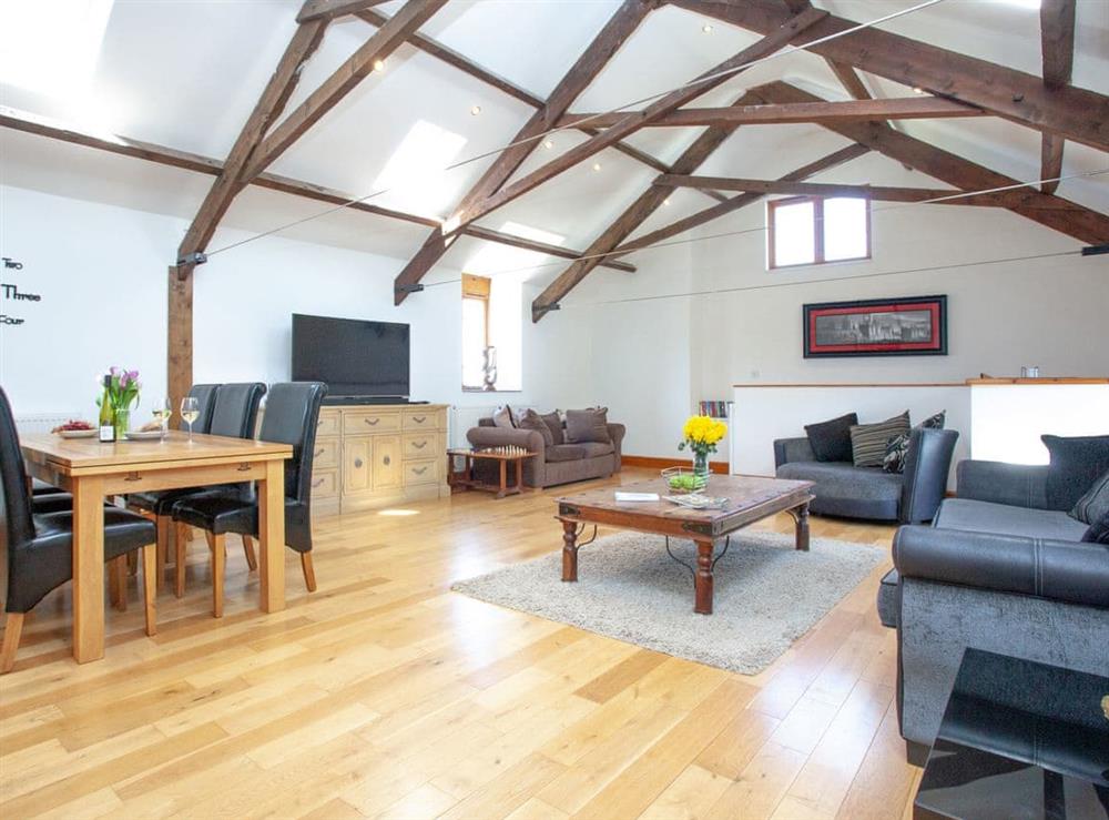 Open plan living space at The Cow Shed in Tiverton, Devon